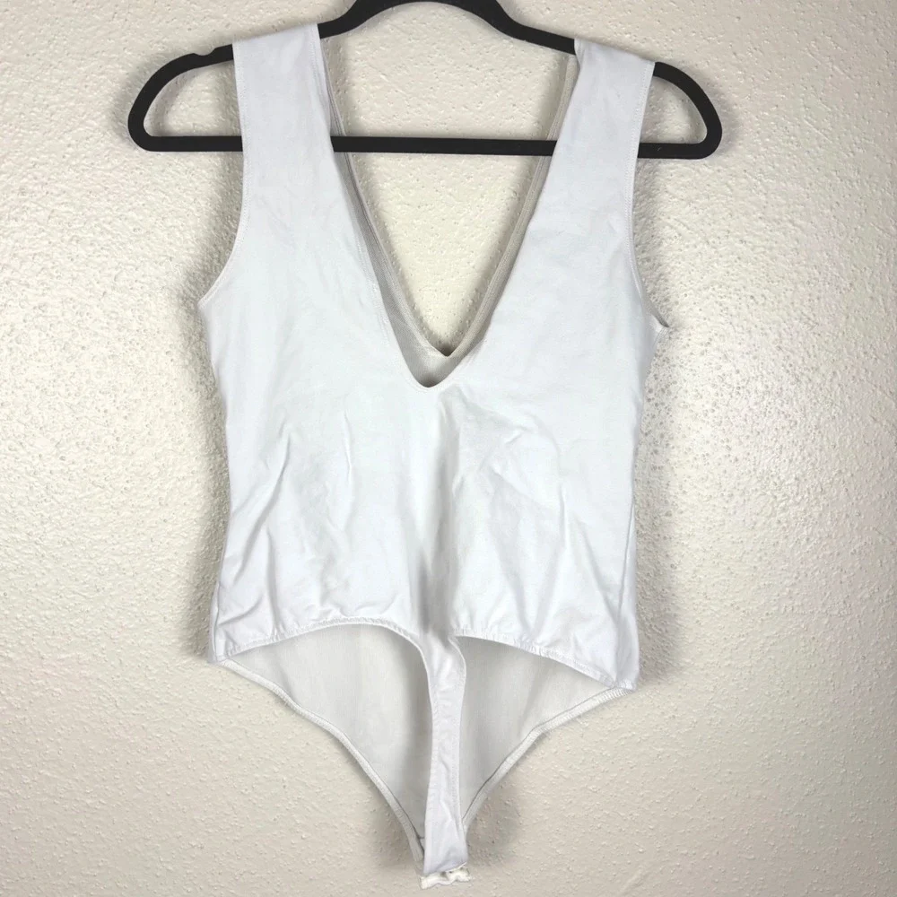 Free People Keep It Sleek White V-Neck Thong Bodysuit Size M Sleeveless Top